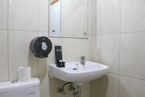 Tranquil Designed and Homey 2BR at Springlake Summarecon Bekasi Apartment By Travelio