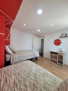 Appartements Casa Bella - Clim, Exterieur, Jeux arcade : photos des chambres