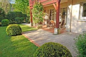 Bel appartement spacieux avec jardin et piscine