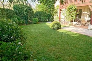 Bel appartement spacieux avec jardin et piscine