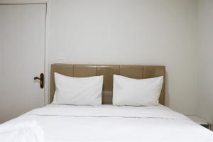 Homey and Comfort Living 2BR at Daan Mogot City Apartment By Travelio