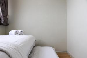 Homey and Comfort Living 2BR at Daan Mogot City Apartment By Travelio