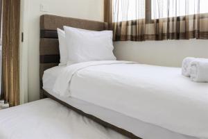 Homey and Comfort Living 2BR at Daan Mogot City Apartment By Travelio