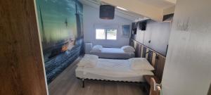 Villas Villa Tre les Pins, 7 chambres, a 100m du LAC DE LACANAU : photos des chambres