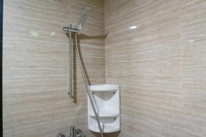 Vibrant Luxurious 1BR Apartment at La Riz Supermall Mansion By Travelio