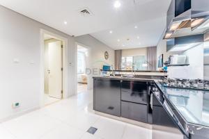 Pool and City View 1BR Near Dubai Water Canal, The Cosmopolitan, Business Bay by Deluxe Holiday Homes