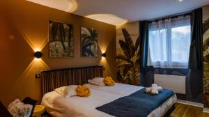 Hotels Le Clos Du Pontic Logis et Cit'Hotel : photos des chambres