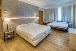 Triple Room room in Hotel Nasco