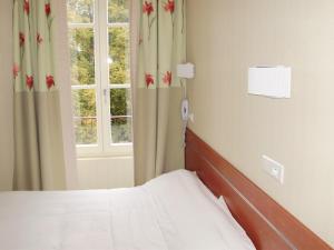 Appart'hotels Garden & City Luxeuil Ex Le Metropole et Les Thermes : photos des chambres