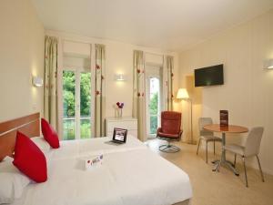 Appart'hotels Garden & City Luxeuil Ex Le Metropole et Les Thermes : photos des chambres