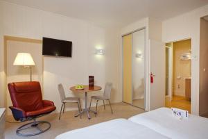 Appart'hotels Garden & City Luxeuil Ex Le Metropole et Les Thermes : photos des chambres