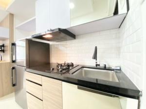 Best Deal 2BR at Grand Asia Afrika Apartment By Travelio