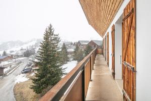 Appartements Les 4D - Pistes a 800m, parking prive : photos des chambres
