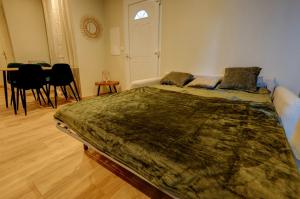 Appartements Havre de paix pres de Perouges, charme et confort : photos des chambres