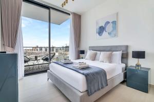 Exceptional 1BR flat wBalcony Gym & Pool in JVC