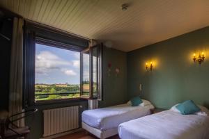 Hotels Logis Hotel et Restaurant La Bombardiere : photos des chambres