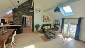 Appartements L-atelier De Neuville : photos des chambres