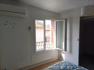 Appartements Maison de village au centre de Thuir jusqu-a 5 personnes et 1 bebe : photos des chambres