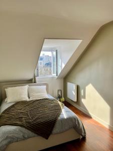 Appartements Au pied du Chateau : photos des chambres