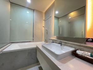 The Astra Suites condominuim - By May