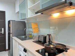 The Astra Suites condominuim - By May