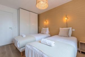 Appartements Appartement 2 chambres avec parking et balcon : photos des chambres