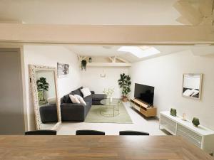 Appartements Nid Douillet - En ville - Climatise : photos des chambres