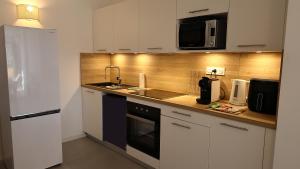 Appartements Appt T2, terrasse, Piscine, acces plage : photos des chambres