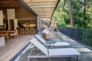 Riverside Haven Elegant House with Serene Forest