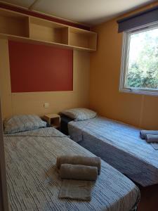 Campings Mobilhome dans camping 3 etoiles en Provence : photos des chambres