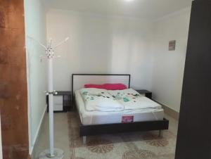 One bedroom flat with large terrace in a villa with swimming pool