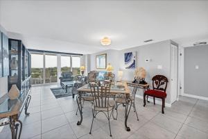 Anchorage Resort 8th floor condo in Siesta Key with private beach access pool boat dock 0894