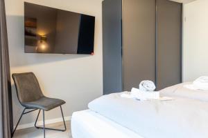 BeltBlick 16 - Moderne Ferienwohnung direkt an der Ostsee mit Meerblick und Sauna!