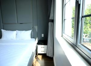 Phòng Bốn Người Có Phòng Tắm Riêng (Quadruple Room with Private Bathroom)