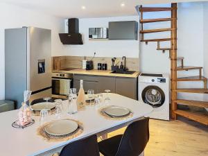Appartements L-EVASION appartement entierement renove a 15min de Geneve : photos des chambres