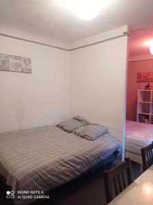 Appartements taverny 2 pieces , 2 lits de 2 places : photos des chambres