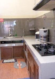 Homestay Malioboro Greenhouse by HomiQ
