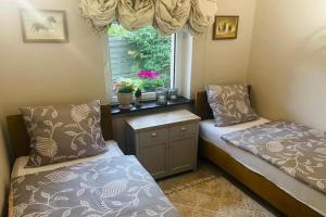 Holiday home with sauna and whirlpool