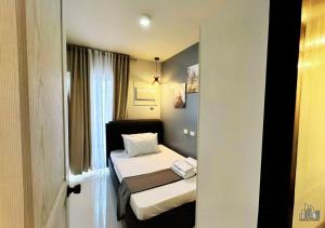 Palawan 2BR Staycation with Swimming Pool, Gym & Parking - B1 5Kunzite