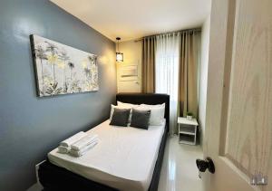 Palawan 2BR Staycation with Swimming Pool, Gym & Parking - B1 5Kunzite