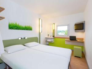 Hotels Ibis Budget Angers Parc des Expositions : photos des chambres