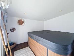 Maisons de vacances Maison avec jacuzzi : photos des chambres