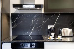 Maisons de vacances ACACIAS - Agreable appartement dans maison - Menton - Parking prive : photos des chambres
