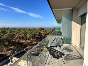 Hevenia Apartament 75 z bocznym widokiem na morze