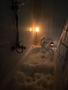 Cozy bedroom overlooking downtown & the Nile