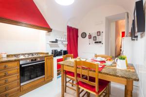 A casa di Angiulì - Casa Vacanze