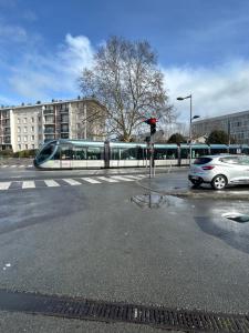 Appartements Large bright T4, tram, parking : photos des chambres
