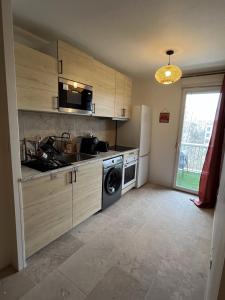 Appartements Large bright T4, tram, parking : photos des chambres