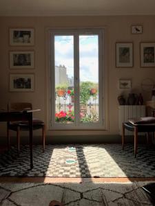 Cozy Montmartre apartment with views over rooftops