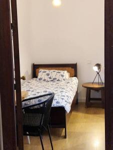 Habitación individual tranquila con baño privado en piso compartido